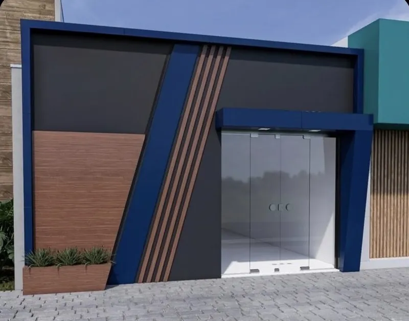 Fachada comercial em ACM azul e cinza com painéis amadeirados e porta de vidro